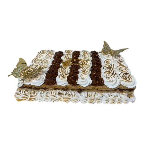 Cake de Señorita grande con merengue quemado, franjas de chocolate y mariposas doradas, Will & Mill Miami