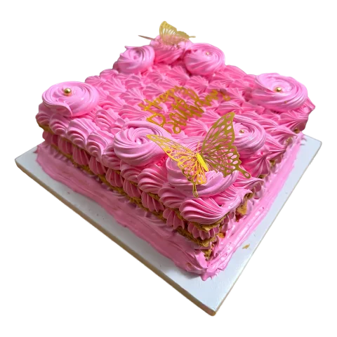 Cake de Señorita rosado con rosetones, mariposas doradas y letrero Happy Birthday, de Will & Mill Miami